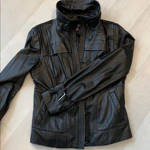 Danier leather jacket. size 12 US. Medium warm.